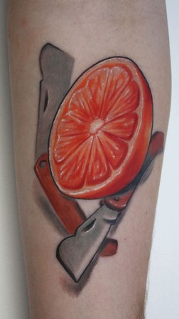 Ty McEwen - Orange tattoo